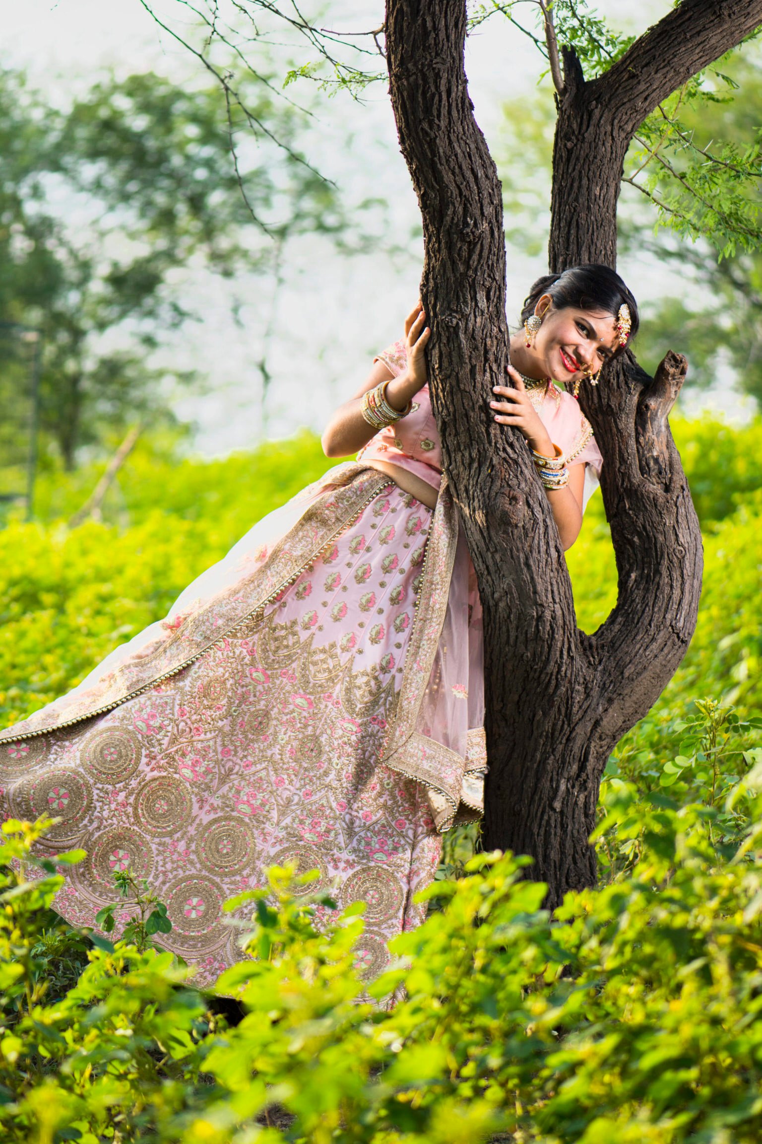 Home beautiful indian bride in traditional wedding dress.